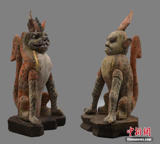 圖為慕容智墓出土鎮(zhèn)墓獸。 中新社發(fā) 甘肅省文物局 供圖
